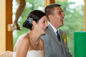 bride and groom laughing during ceremony – Incline Village St Francis of Assisi wedding photography