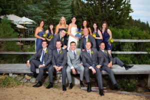 bridal party on beach portrait, sitting on pier – North Lake Tahoe Kings Beach wedding photography
