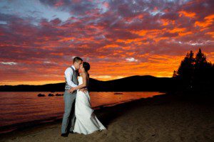 bride and groom on beach at sunset – North Lake Tahoe Kings Beach wedding photography