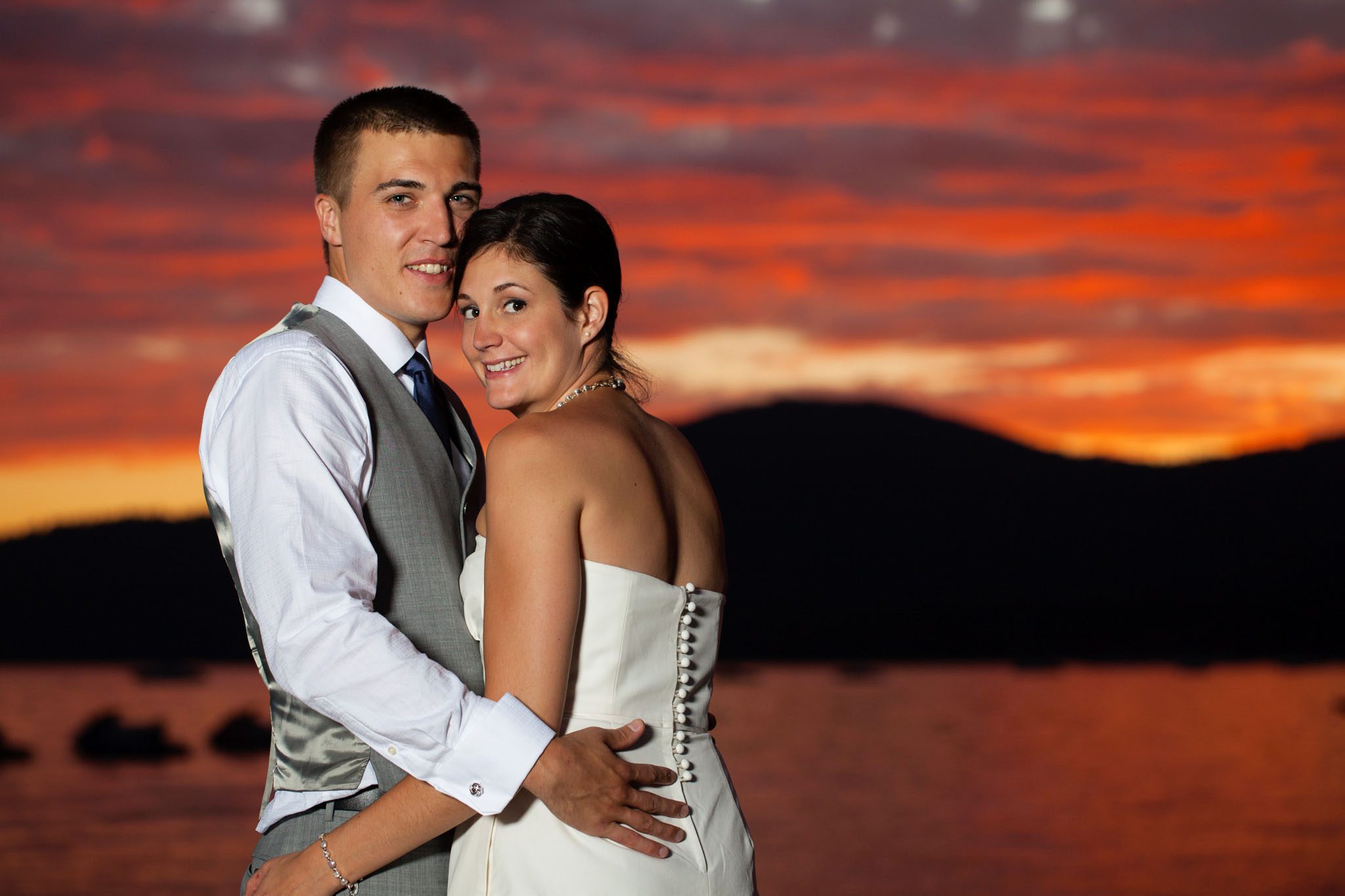 bride at groom on beach at sunset – North Lake Tahoe Kings Beach wedding photography