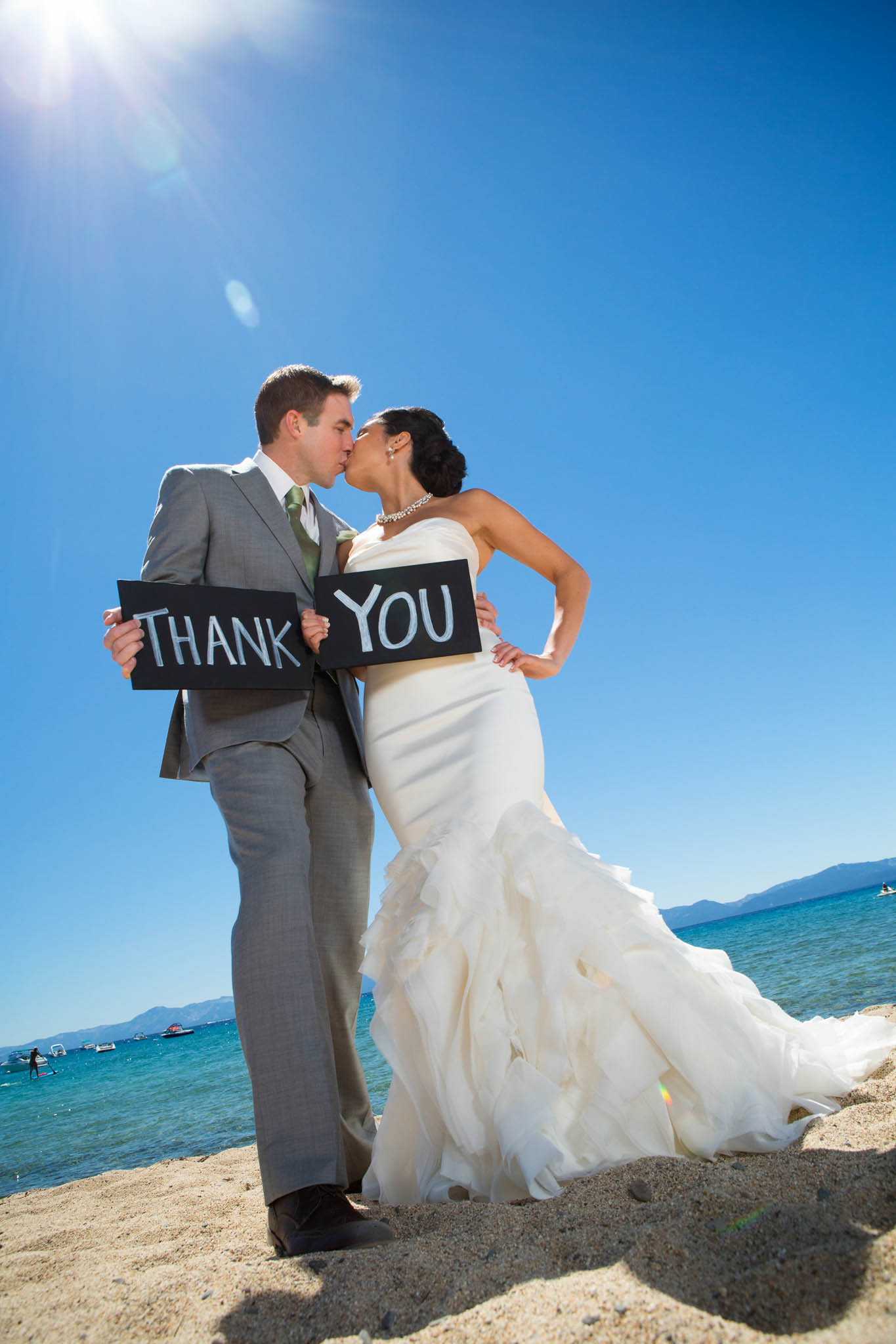 bride and groom with thank you sign – Lake Tahoe Hyatt Persian American wedding photography