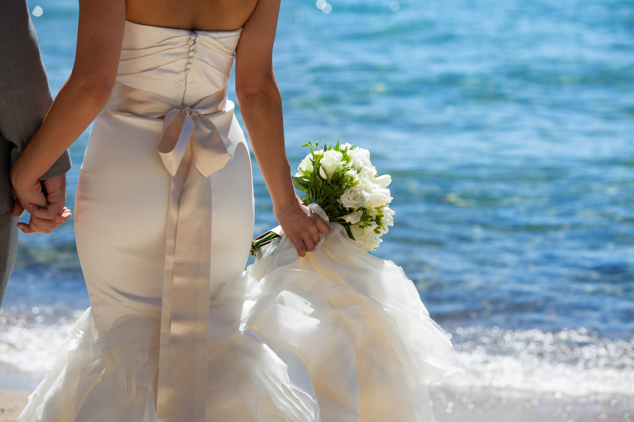 bride's dress and bouquet detail – Lake Tahoe Hyatt Persian American wedding photography