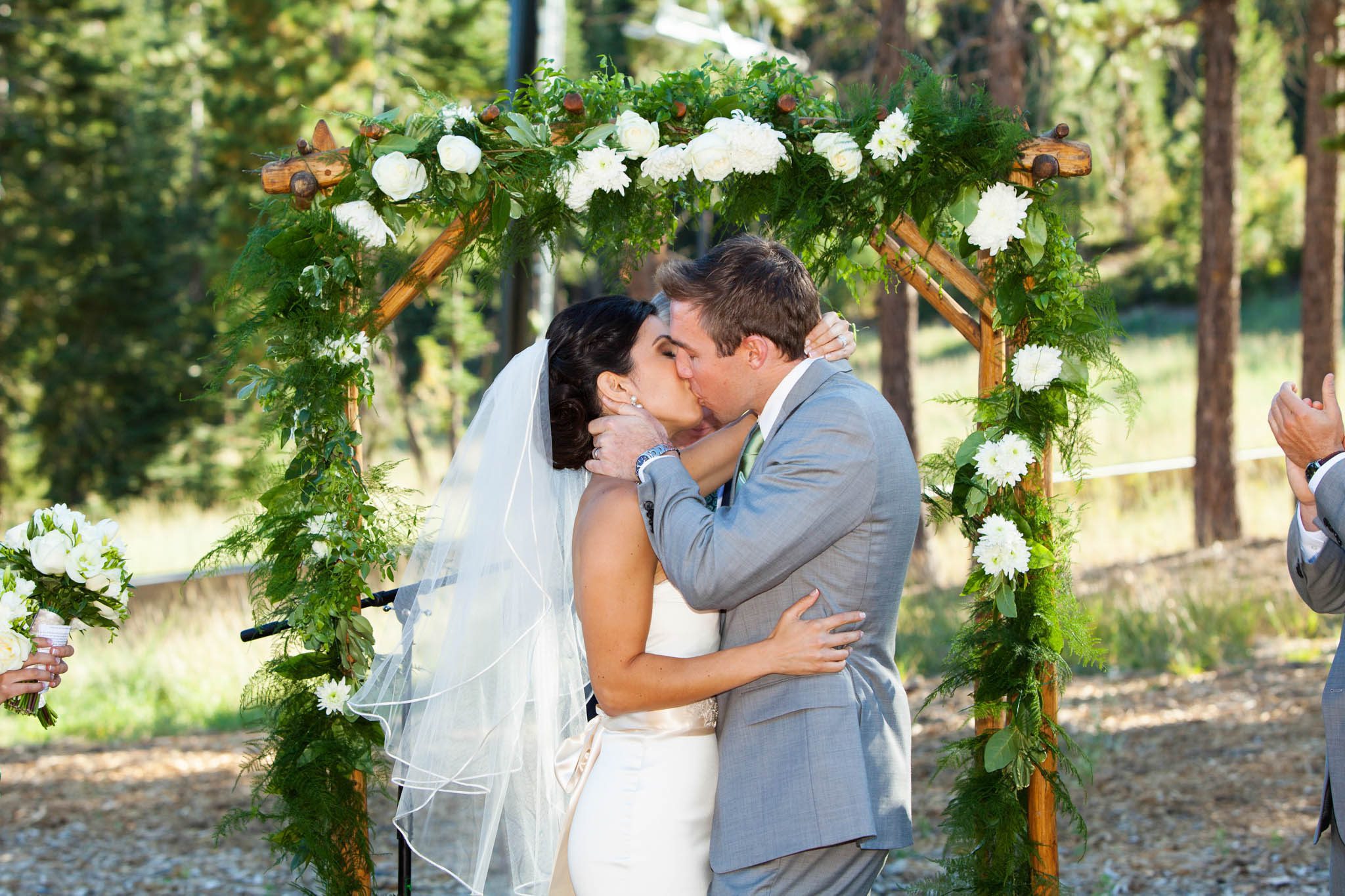 bride and groom first kiss ceremony – Lake Tahoe Truckee Ritz Carlton Persian American wedding photography