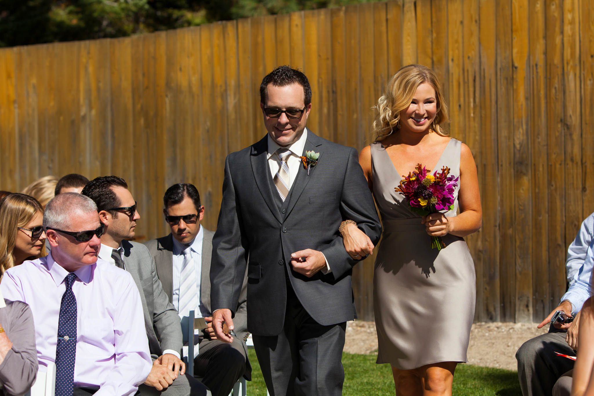 bridesmaid and groomsman walking down aisle – North Lake Tahoe Incline Village wedding photography