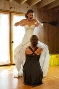bride putting on dress – Lake Tahoe Meeks Bay wedding photography