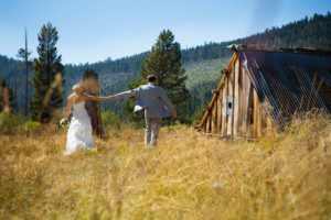 bride and groom walking in meadow – Lake Tahoe Meeks Bay wedding photography