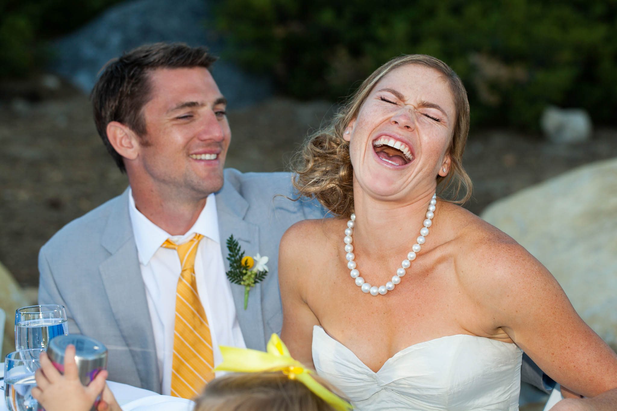 bride and groom laughing during toasts – Lake Tahoe Meeks Bay wedding photography
