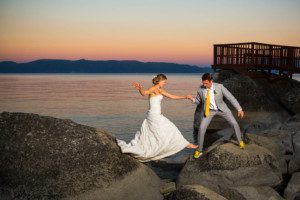brode and groom sunset jumping rocks – Lake Tahoe Meeks Bay wedding photography