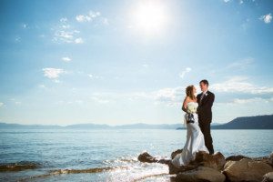 bride and groom portrait beach on rocks Hyatt tahoe – nina wedding photographer