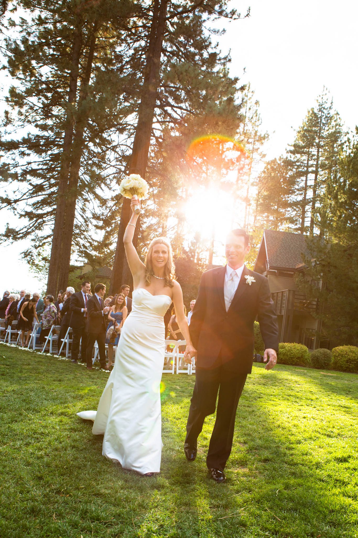 bride and groom cheering after ceremony Hyatt Tahoe cottage green – nina wedding photographer