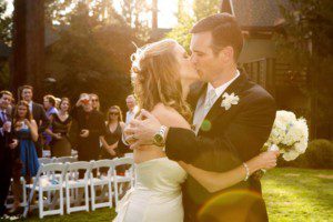 bride and groom kissing after ceremony Hyatt Tahoe – nina wedding photographer