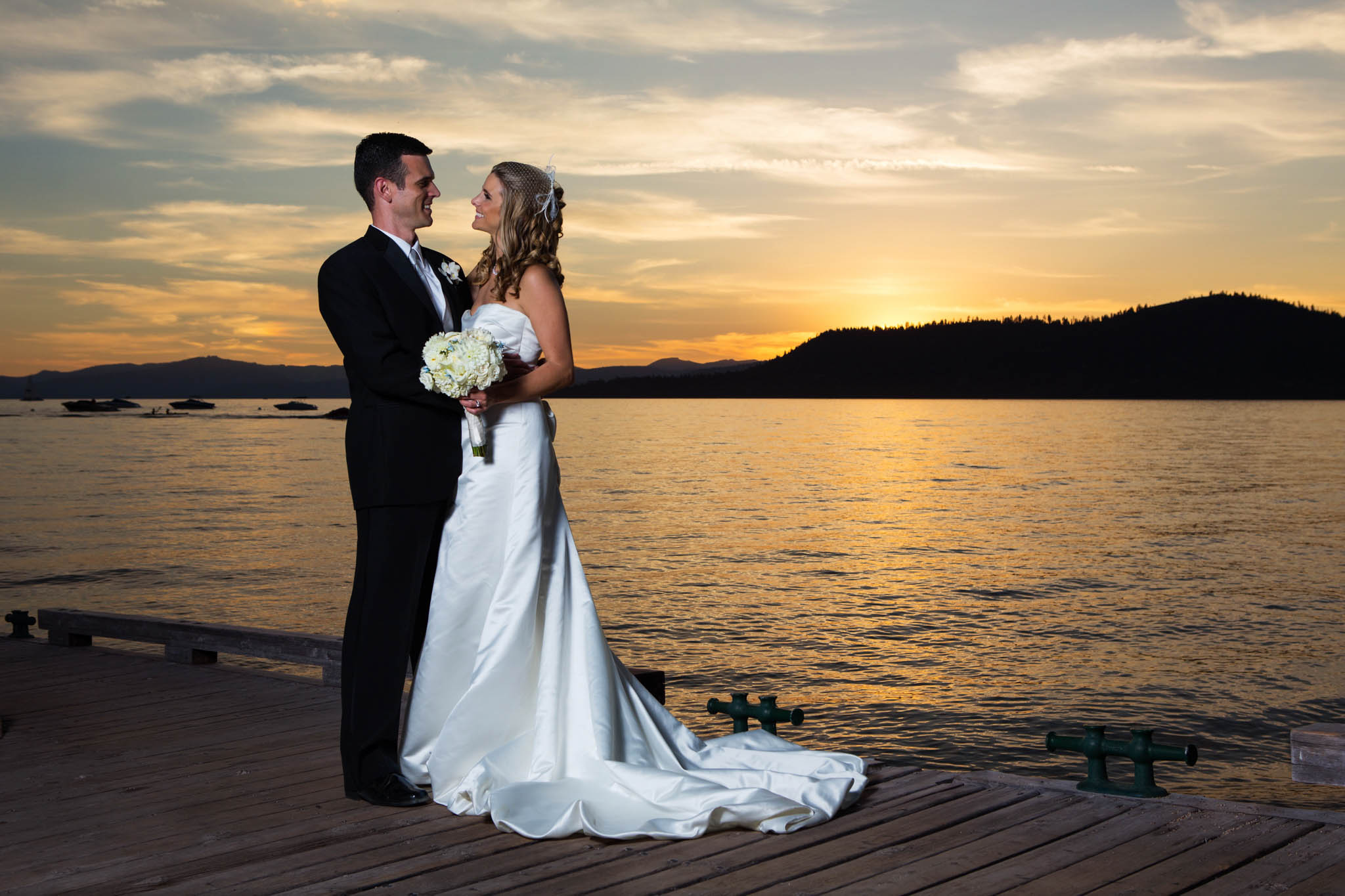 bride and groom on pier portrait Lake tahoe – nina wedding photographer