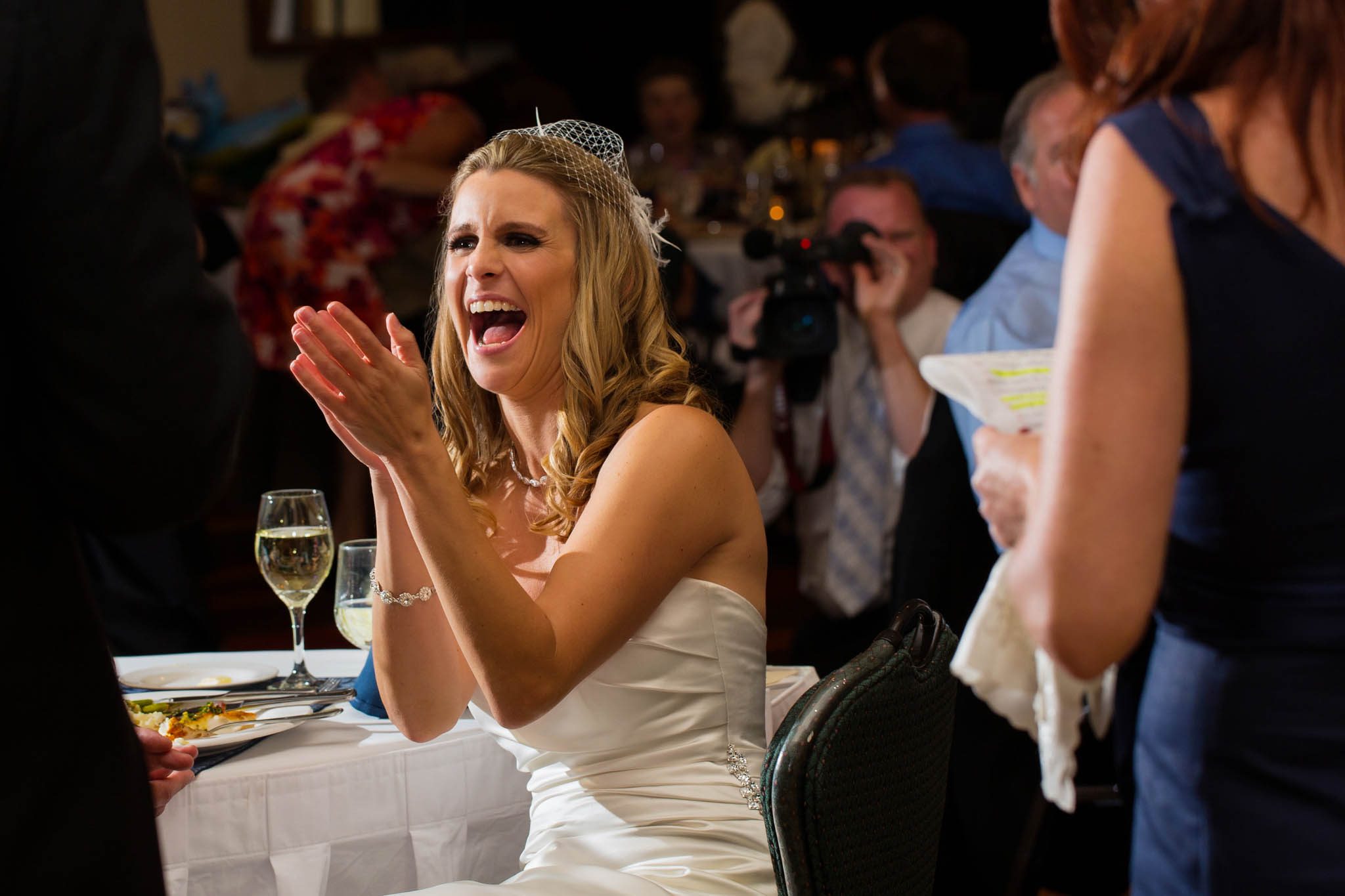 bride laughing during toast – nina wedding photographer