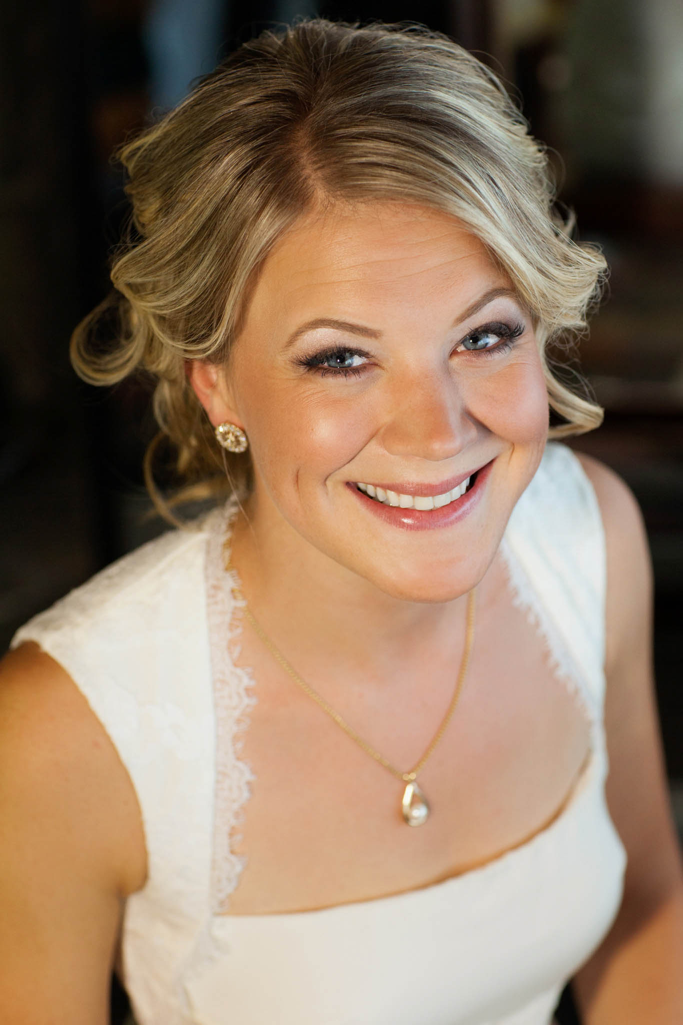 brie getting ready close-up smiling – South Lake Tahoe lakefront beach wedding nina photographer