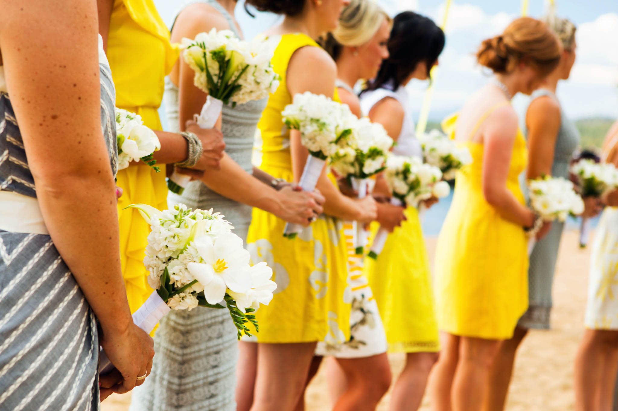 bridesmaids' bouquets during ceremony – South Lake Tahoe lakefront beach wedding nina photographer
