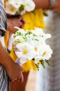 bridesmaid's bouquet during ceremony – South Lake Tahoe lakefront beach wedding nina photographer