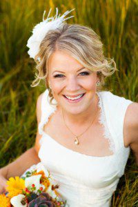 bride smiling portrait, inmeadow, tall grass – South Lake Tahoe lakefront beach wedding nina photographer