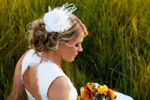 bride close-up, profile, in meadow, tall grass – South Lake Tahoe lakefront beach wedding nina photographer