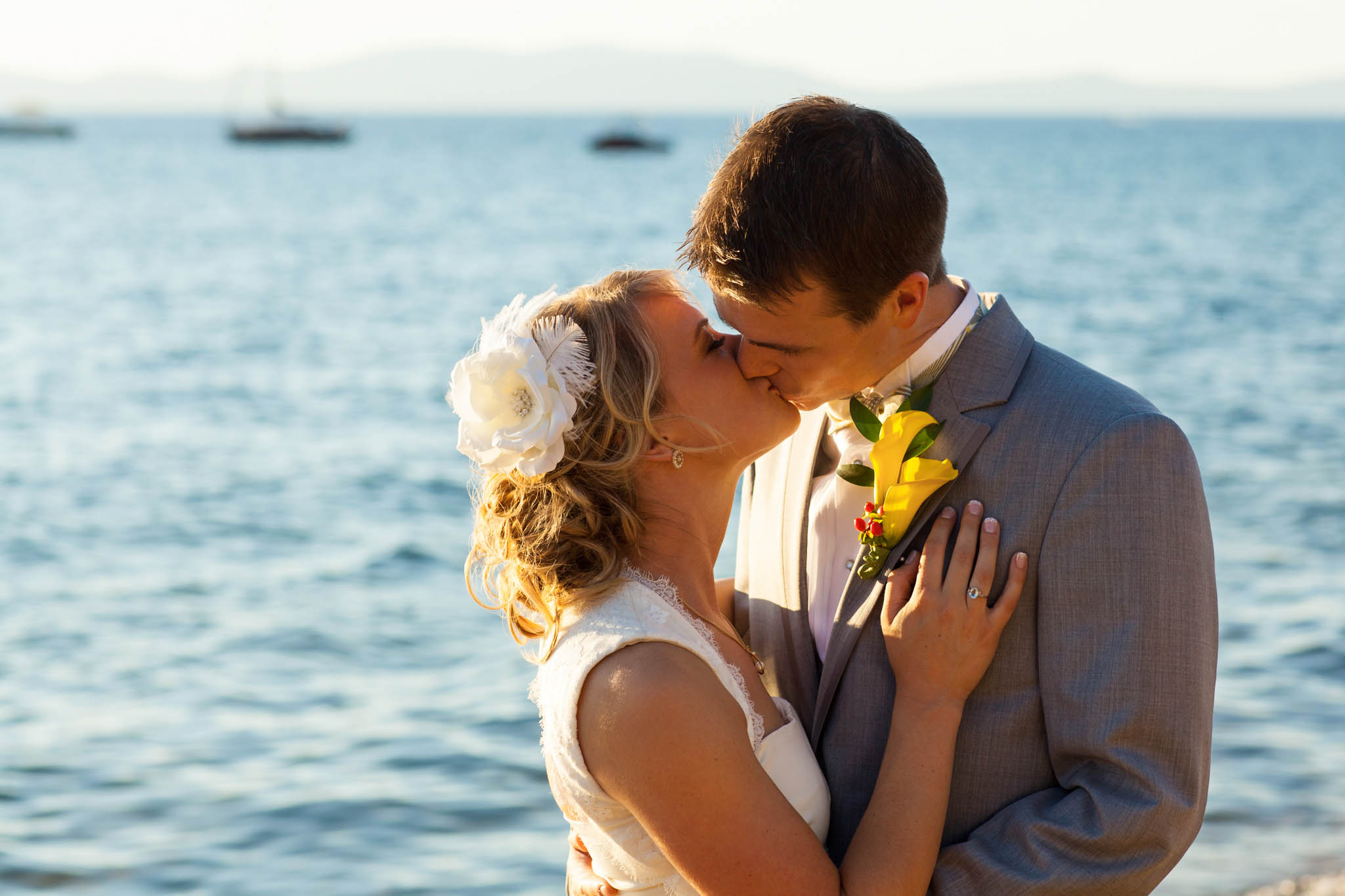 bride and groom kissing lose-up on beach – South Lake Tahoe lakefront beach wedding nina photographer