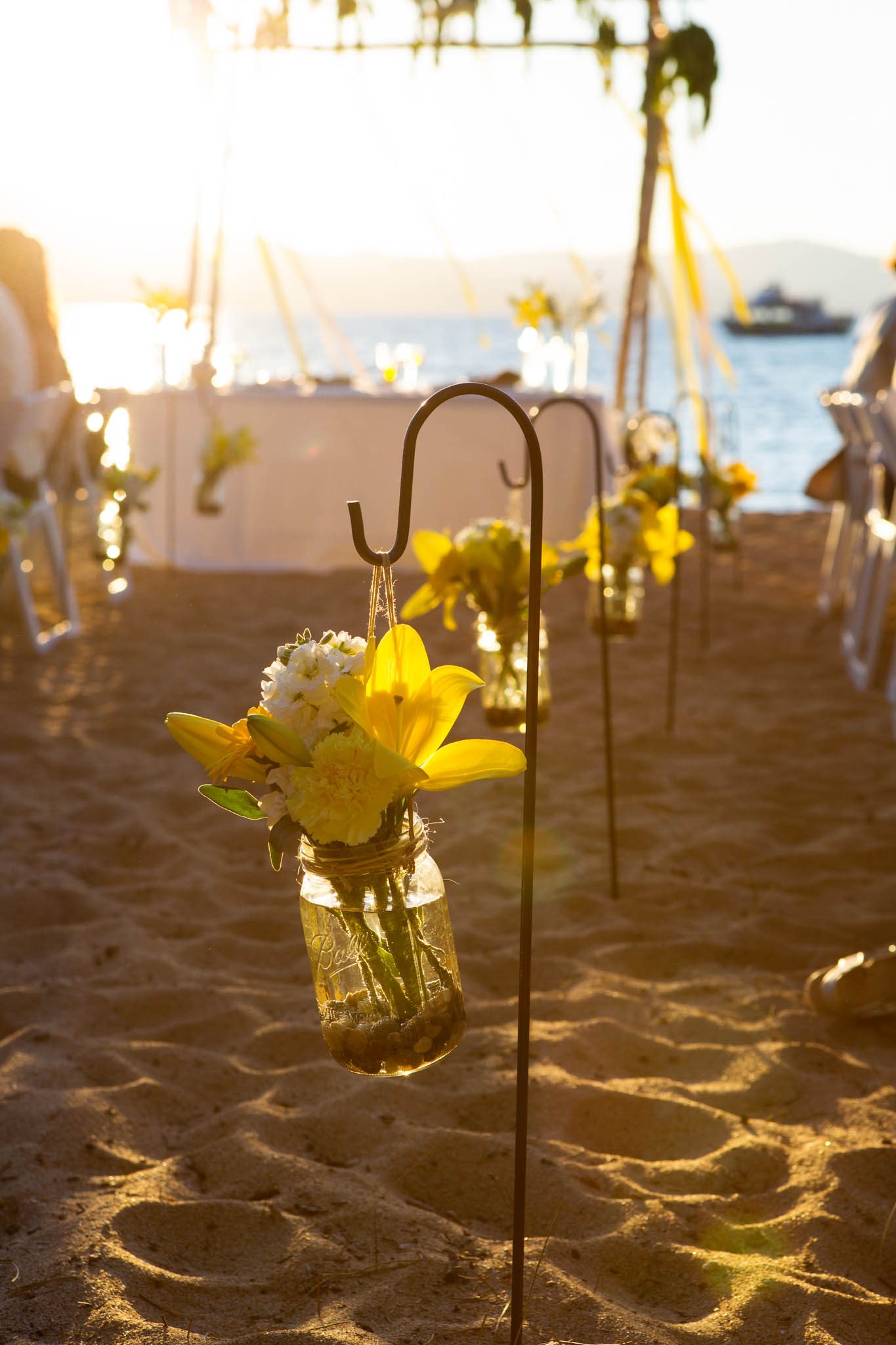 reception dinner decor flowers detail – South Lake Tahoe lakefront beach wedding nina photographer