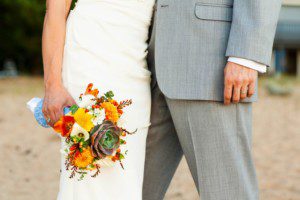 bride, groom, bouquet detail – South Lake Tahoe lakefront beach wedding nina photographer