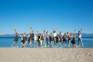 bridal party portrait jumping on beach – Lake Tahoe Meeks Bay wedding photography