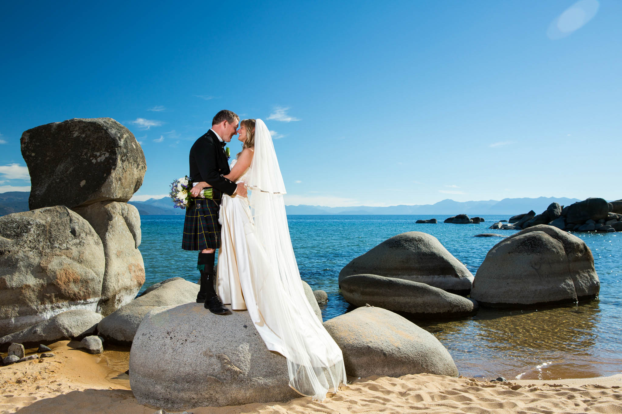 brode groom beach rocks lake – Fairwinds Tahoe wedding photography