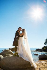 bride groom beak rocks sun flare portrait – Fairwinds Tahoe wedding photography