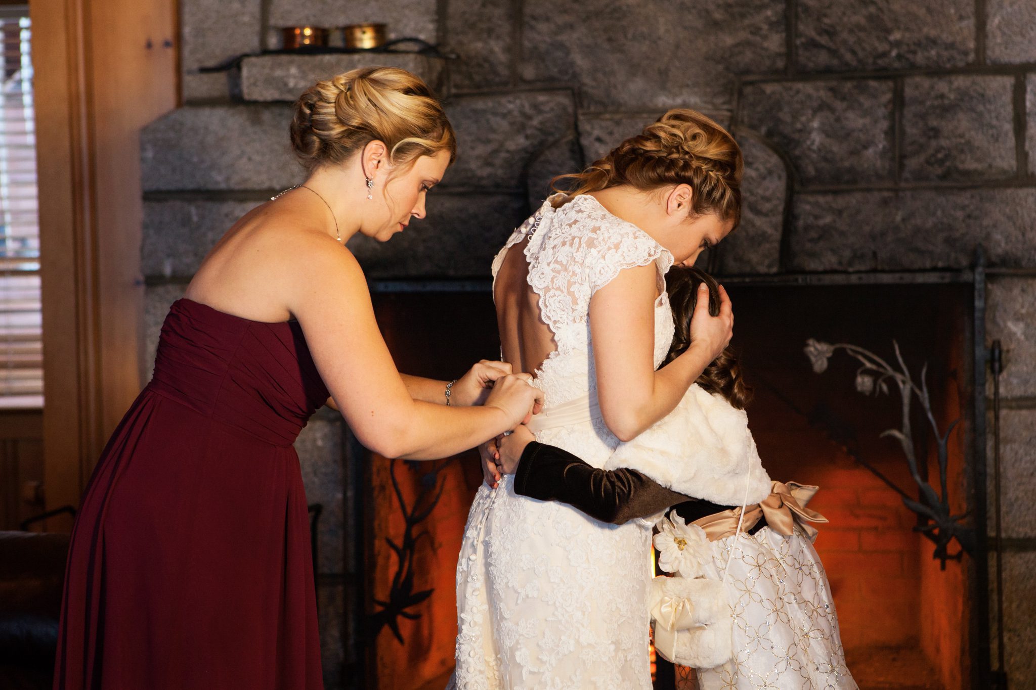 bride, daughter, flower girl, bridesmaid, putting on dress