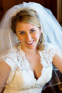 bride portrait by window, close-up, smiling