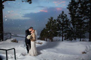 winter wedding bride groom kissing in snow