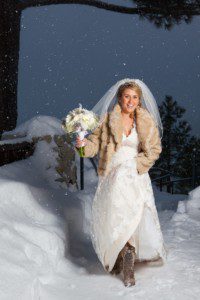 winter wedding bride walking in snow