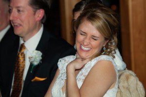 wedding reception toasts bride laughing